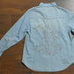 Blue denim shirt with map design on back