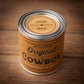 Cowboy soy candle in a metal can.
