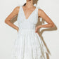 Woman in white lace dress.