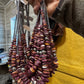 Hand holding necklaces - 4859F9E2 beaded design