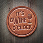 Brown leather It's Wine O'Clock coaster.