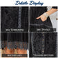 Details of black dress with embroidery, pockets, and lace.