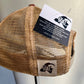 Brown mesh-backed hat with The Goat Stock tag.