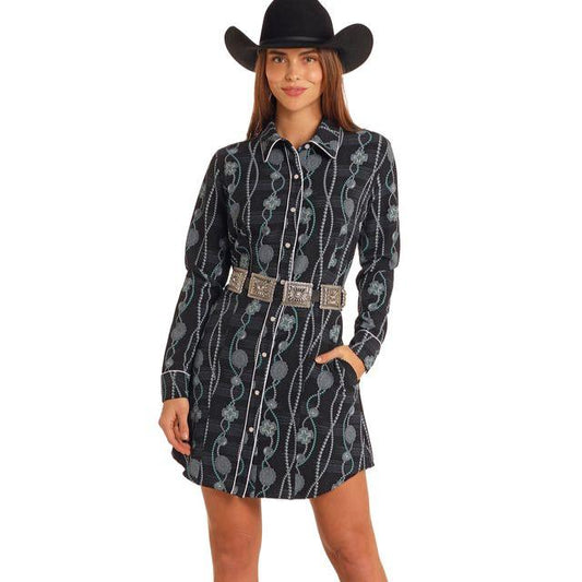 Cowgirl in patterned dress, 6vCiF1ci