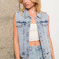Woman in denim vest and jeans