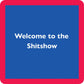 Blue square with text Welcome to the Shitshow in a red square frame.
