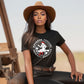 Black woman wearing a Bourbon Cowgirl t-shirt.