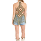 Woman in crochet top and denim shorts