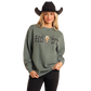 Woman in Howdy sweatshirt and cowboy hat