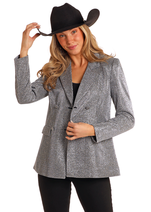 Woman in silver blazer and cowboy hat
