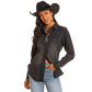 Woman in black denim shirt and cowboy hat