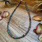 Turquoise & coral beaded necklace on wood, D5DD0807-4EAA