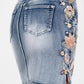 Blue denim skirt with floral embroidery
