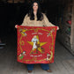 Woman holding red Always Saddle Your Own Horse scarf