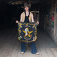Cowgirl holding Always Saddle Your Own Horse banner