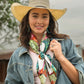 Woman in cowboy hat, scarf, and denim jacket - DSC_5981