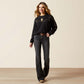 Woman in black sweater and jeans, Western style