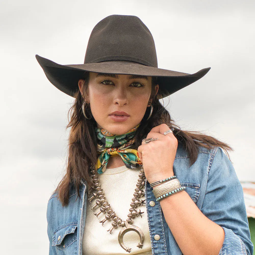 Woman in Geiman Fringe Scarf and Cowboy Hat