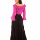 Woman in magenta top and black pants