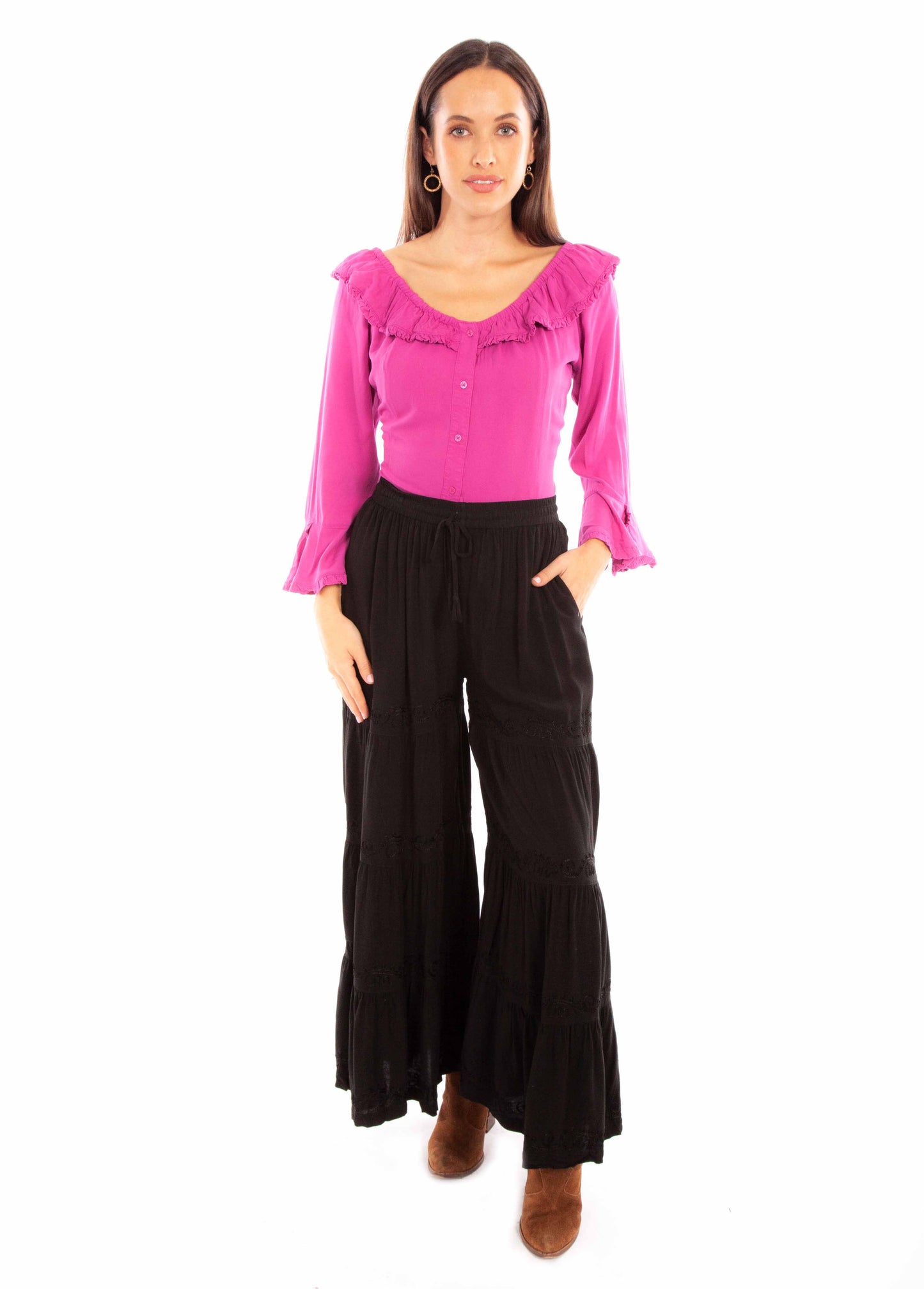 Woman in pink top & black pants