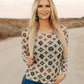 Woman in patterned top