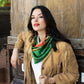 Woman in vintage western fringe jacket and green wild rag scarf