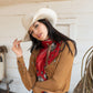 Woman in cowboy hat and red silk scarf