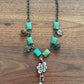 Turquoise and Charms with Horn Pendant Necklace by Amy Kaplan