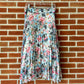Pleated floral skirt with horse print.