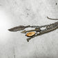 Necklace with feather, arrow, and bead pendants.
