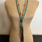 Turquoise beaded necklace on a mannequin - IMG_28572