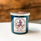 Blue candle with Bourbon Cowgirl label.