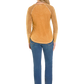 Woman in jeans, shirt, and cowboy hat.