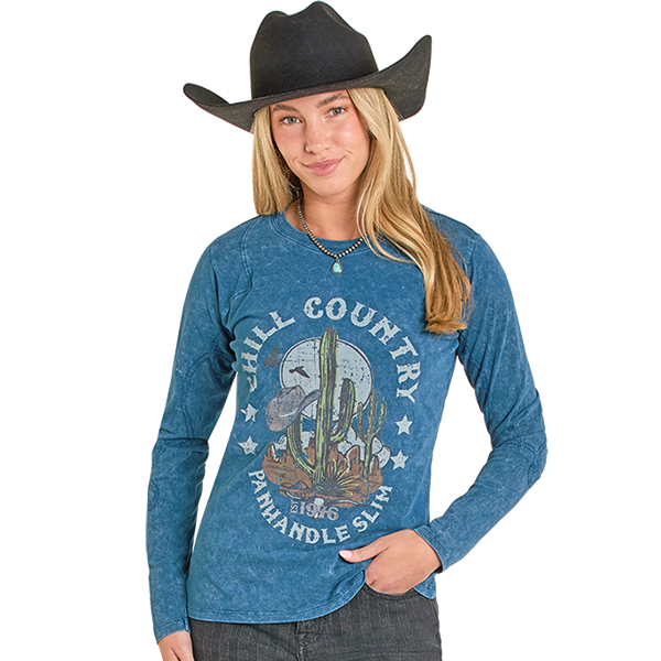 Woman wearing a Panhandle Slim Hill Country shirt and cowboy hat