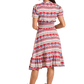Woman wearing LWD1R06344 patterned dress