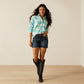 shirt, shorts, and boots