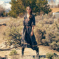 Woman in Onyx Gray Mariana Dress
