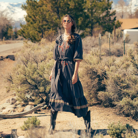 Woman in Onyx Gray Mariana Dress
