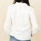 White blouse back view