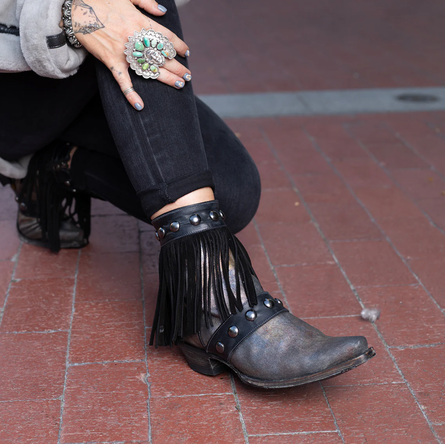 Cowboy boots with fringe, screenshot from September 21