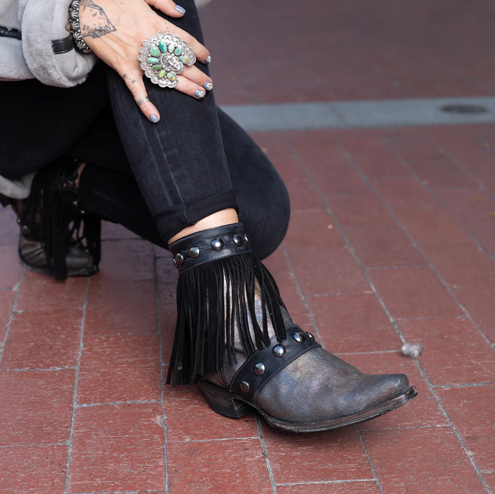 Cowboy boots with fringe, screenshot from September 21