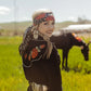 Woman in Western wear with horse, wildflower photo 126 of 549