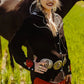 Woman in western wear with horse
