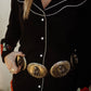 Western wildflower shirt and belt detail.