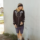 Western Wildflower black shirt and denim skirt.