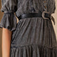 Gray dress with black belt.