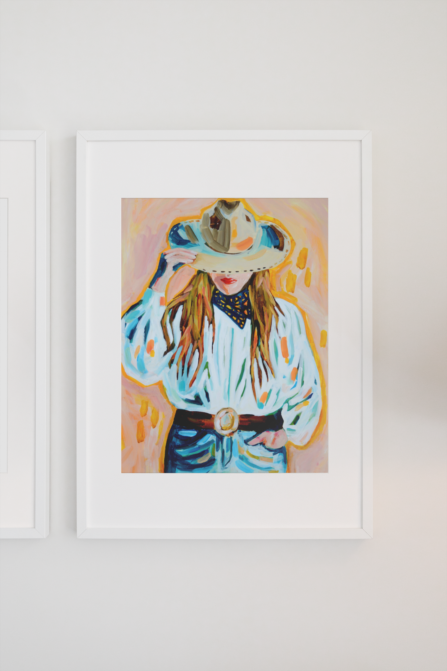 Painting of a woman in a cowboy hat and shirt, framed on a wall.