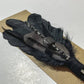 Black feather and bead hair clip.