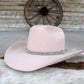 Pink cowboy hat with jeweled band.