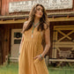 Woman in yellow dress, lifestyle image